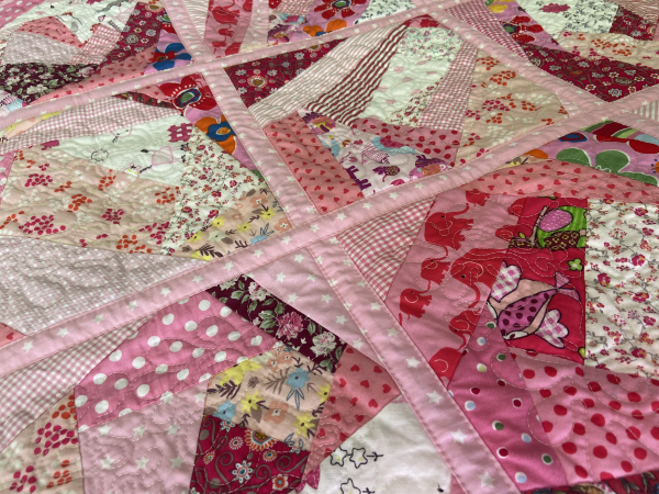 Quiltdecke in rosa rot pink