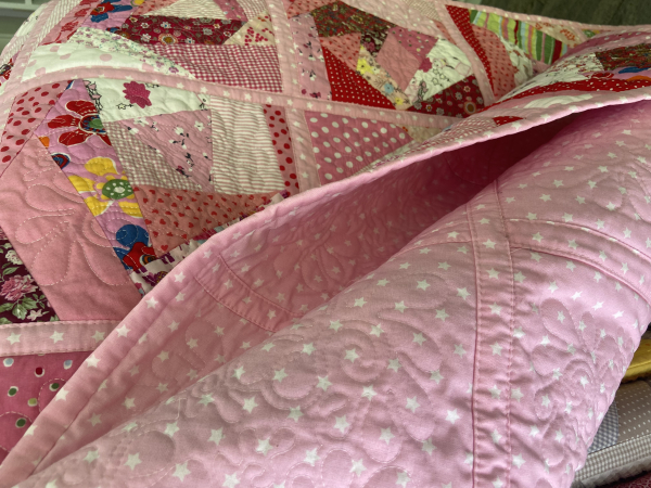 Quiltdecke in rosa rot pink